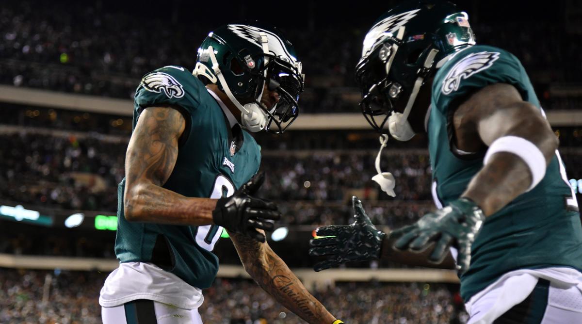 Jan 21, 2023; Philadelphia, Pennsylvania, USA; Philadelphia Eagles wide receiver DeVonta Smith (6) celebrates with wide receiver A.J. Brown (11) after scoring a touchdown in the first quarter against the New York Giants in an NFC divisional round game at Lincoln Financial Field.