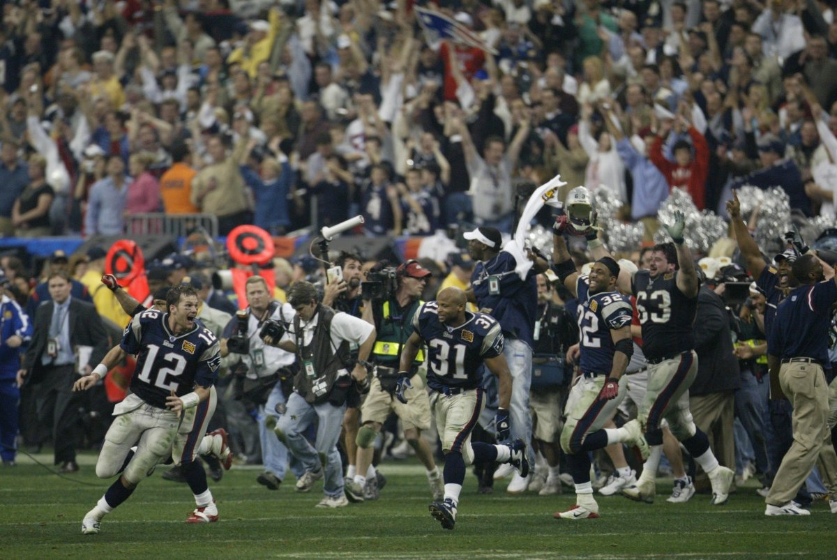 Tom Brady and Patriots teammates celebrate their victory over the Panthers in Super Bowl XXXVIII