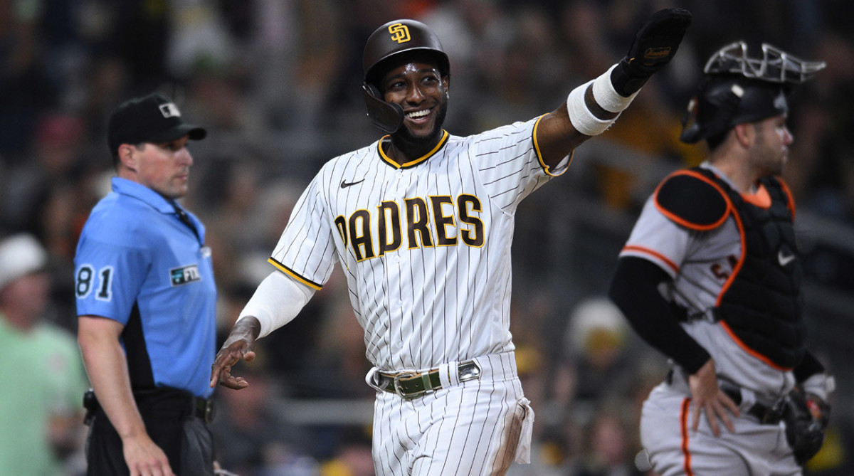 Padres outfielder Jurickson Profar celebrates after scoring a run vs. the Giants.