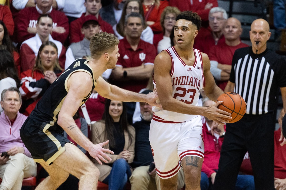 Indiana Hoosiers forward Trayce Jackson-Davis (23) looks to pass the ball while Purdue Boilermakers forward Caleb Furst (1) defends at Simon Skjodt Assembly Hall.