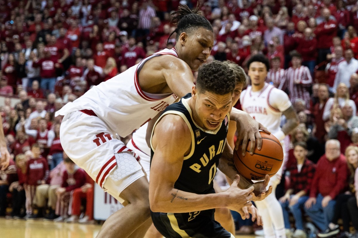 Indiana Hoosiers forward Malik Reneau (5) and Purdue Boilermakers forward Mason Gillis (0) tie up the ball in the second half.