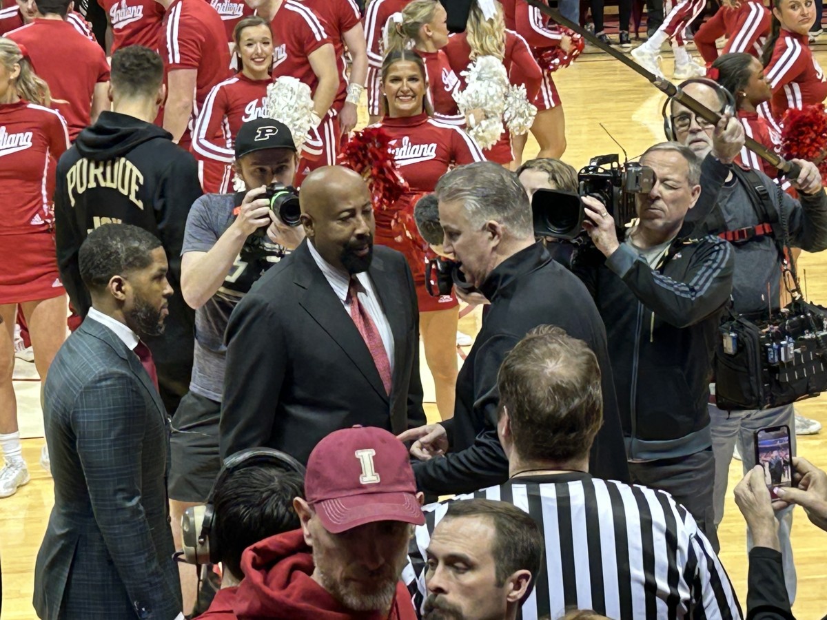 Indiana coach Mike Woodson and Purdue coach Matt Painter chat prior to Saturday's game. (Photo by Tom Brew, HoosiersNow.com