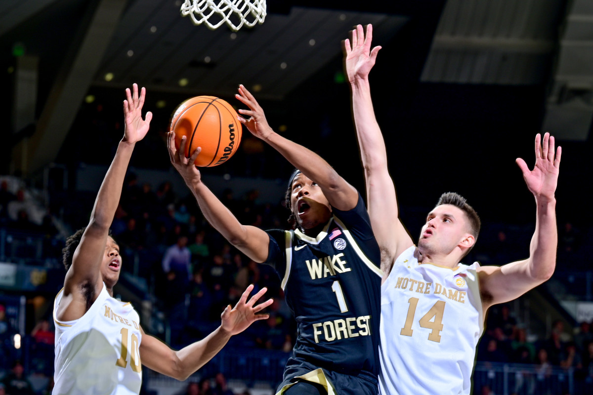 Wake Forest guard Tyree Appleby goes up for a layup against two Notre Dame defenders during the Deacs' 81-64 road win over the Fighting Irish.