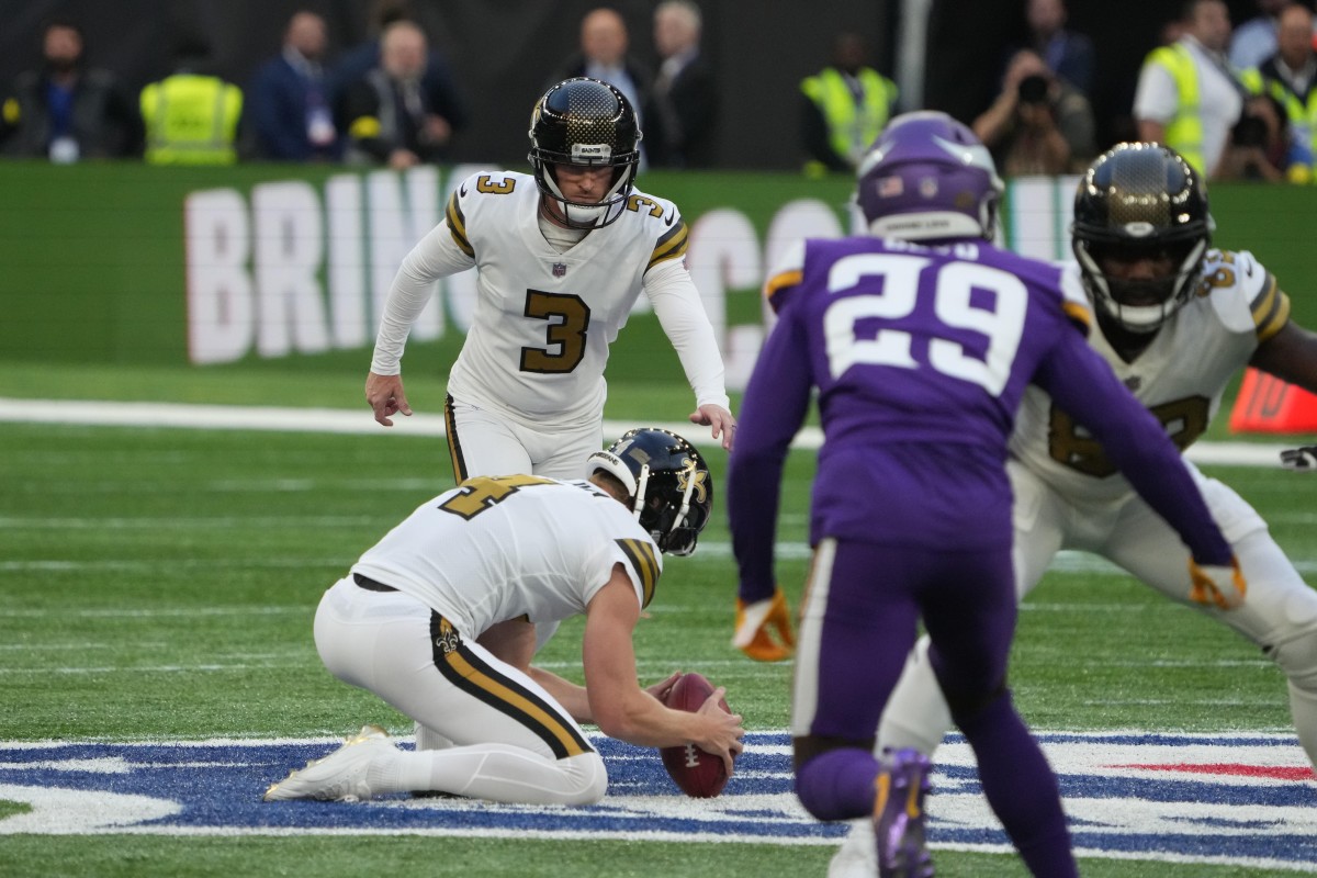 New Orleans Saints kicker Wil Lutz (3) attempts a 61-yard field goal out of the hold of punter Blake Gillikin (4) against the Minnesota Vikings. The Vikings defeated the Saints 28-25. Mandatory Credit: Kirby Lee-USA TODAY Sports