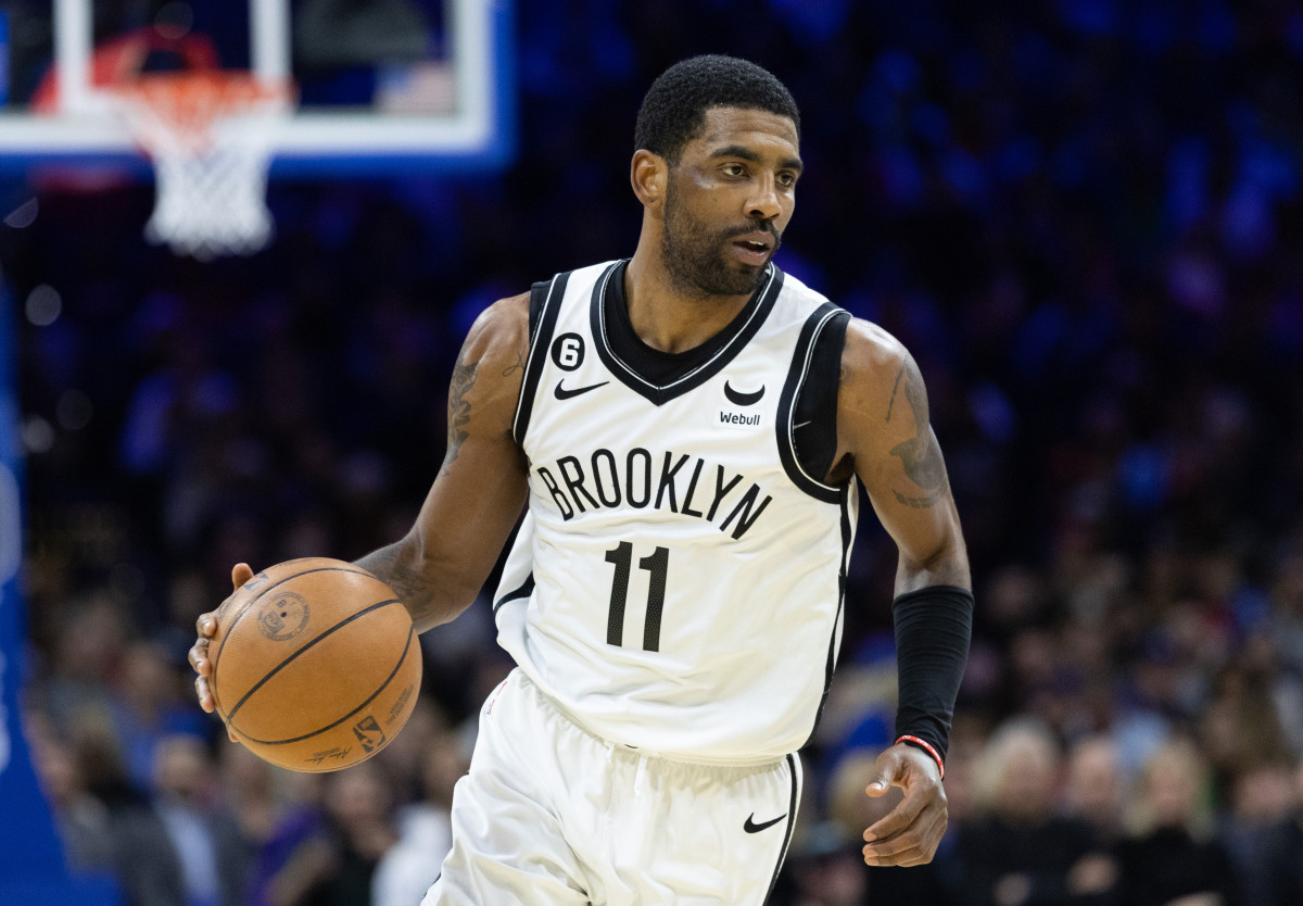 Brooklyn Nets guard Kyrie Irving (11) dribbles the ball