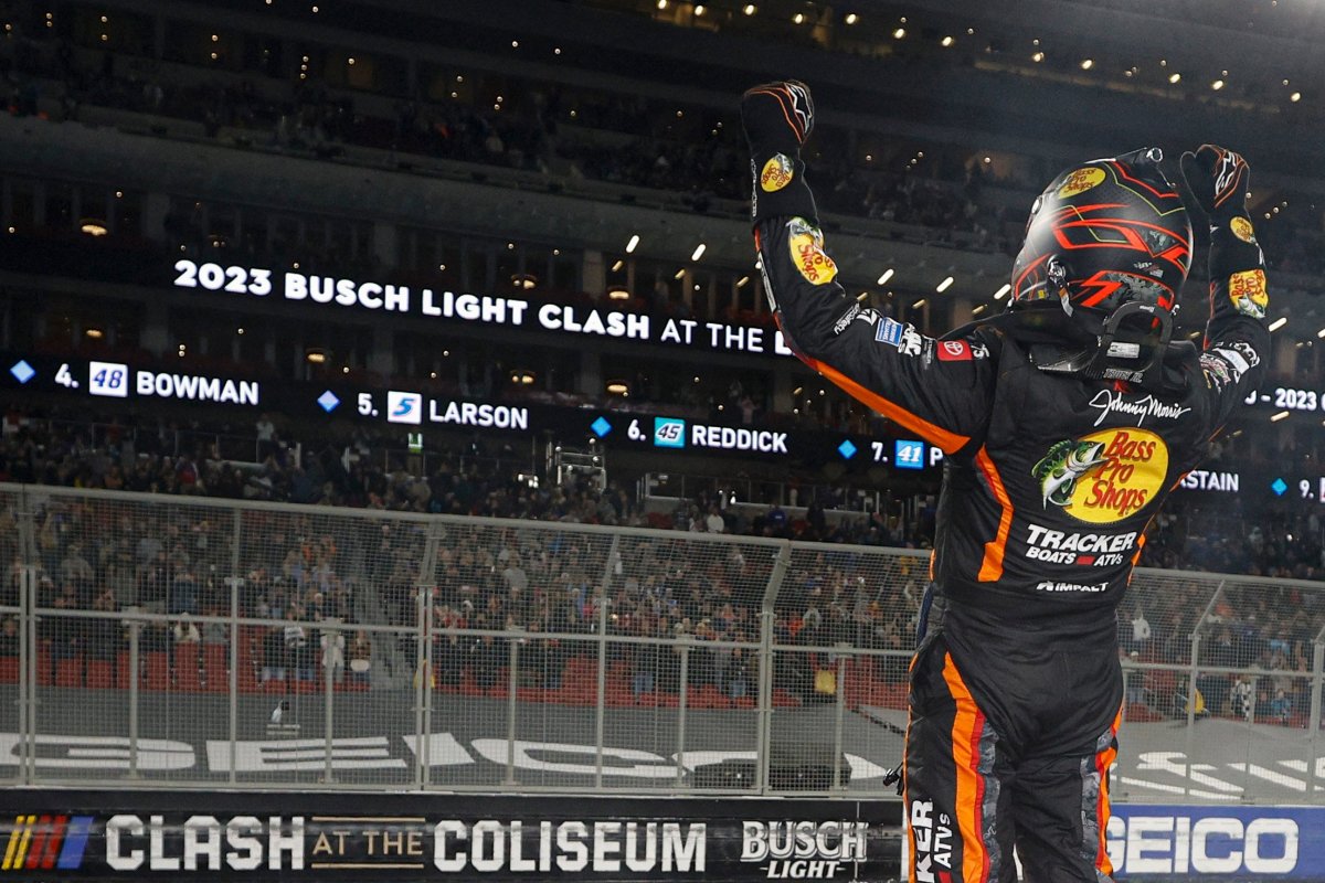 Martin Truex Jr., driver of the #19 Bass Pro Shops Toyota, celebrates after winning the NASCAR Clash at the Coliseum at Los Angeles Memorial Coliseum on February 05, 2023 in Los Angeles, California. (Photo by Chris Graythen/Getty Images)