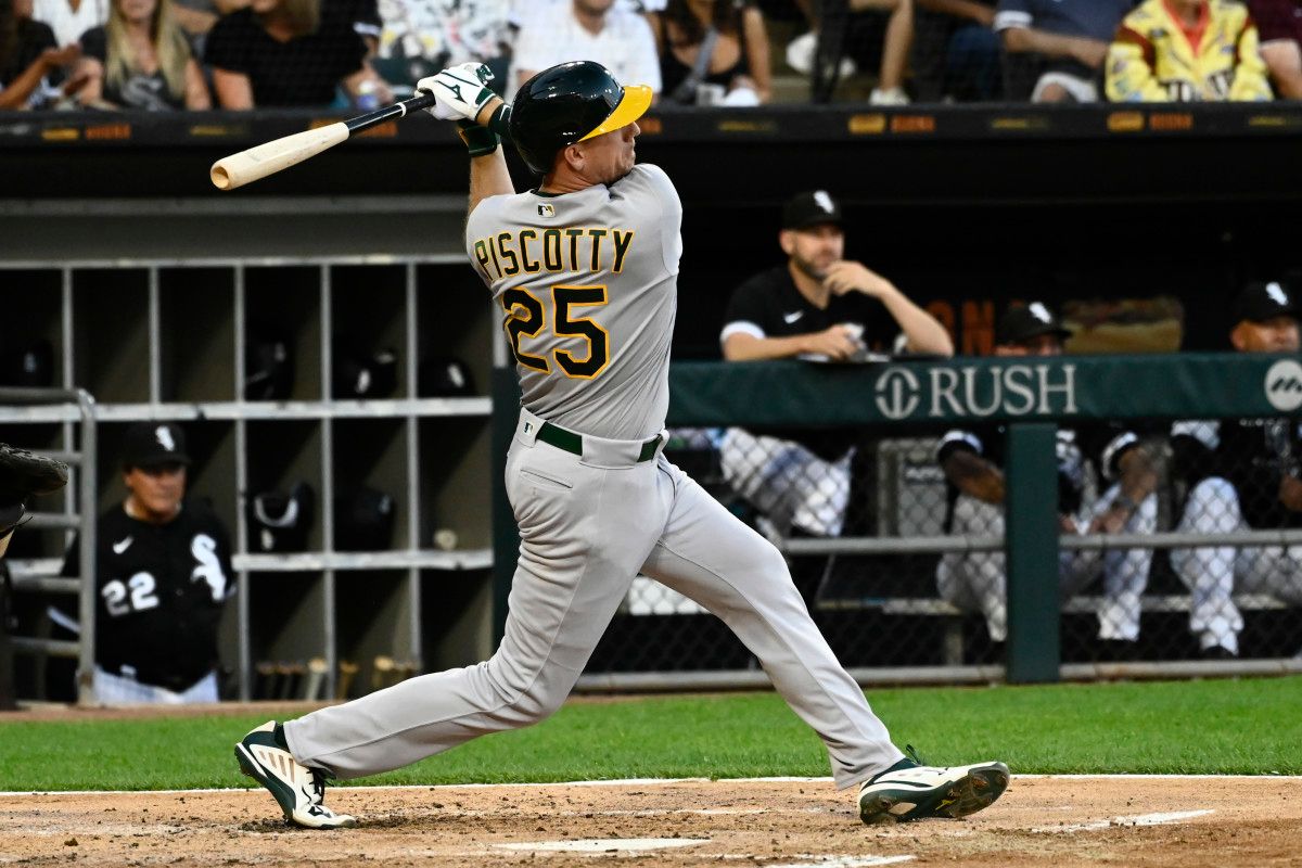 Oakland Athletics right fielder Stephen Piscotty (25) hits a three-run home run against the Chicago White Sox. (2022)