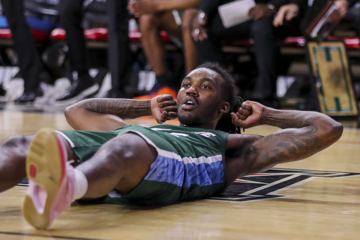 Dec 29, 2022; Cincinnati, Ohio, USA; Tulane Green Wave guard Jaylen Forbes (25) reacts after a play against the Cincinnati Bearcats in the second half at Fifth Third Arena. Mandatory Credit: Katie Stratman-USA TODAY Sports