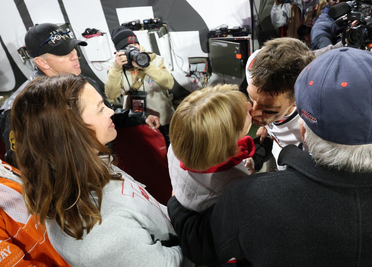Tom Brady's family was waiting for him after he played his last NFL game against the Cowboys in the wild-card round.