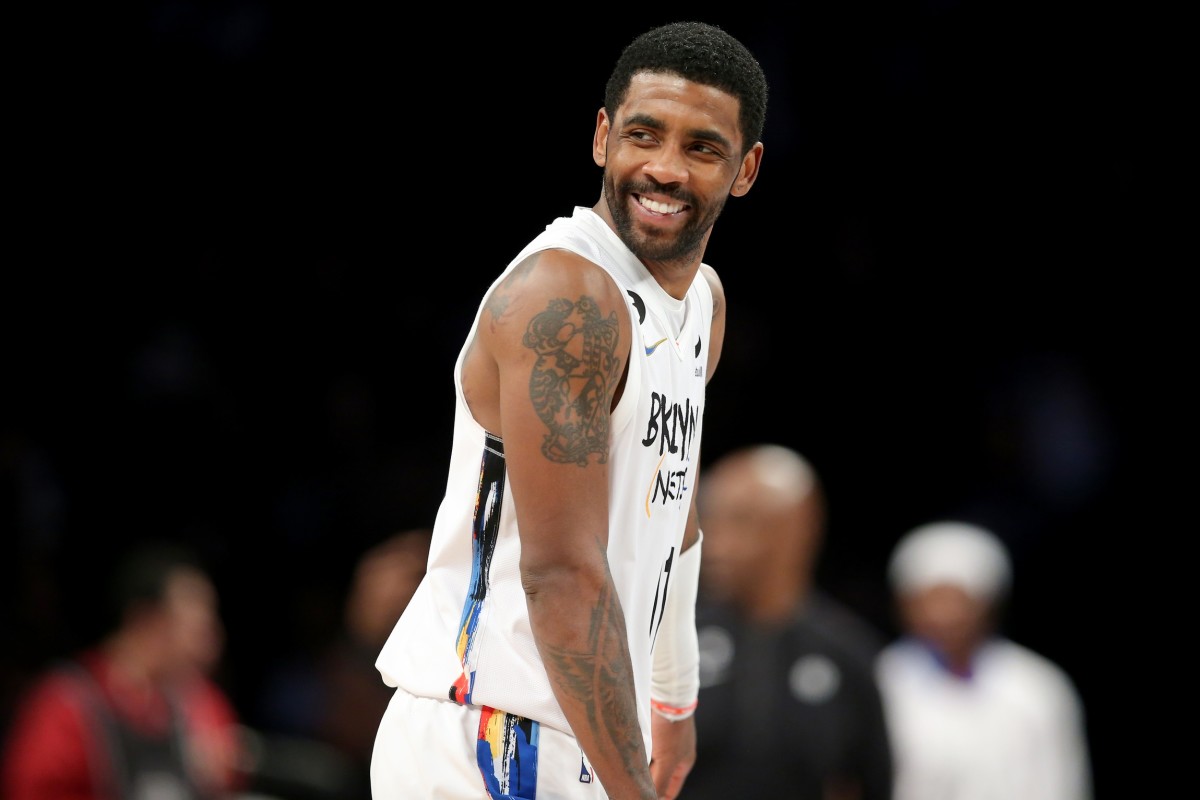 VIDEO Kyrie Irving Arrives in Dallas After NetsMavericks Trade