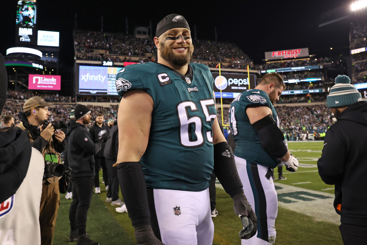 Lane Johnson smiles on the sideline during the Eagles' NFC title game win