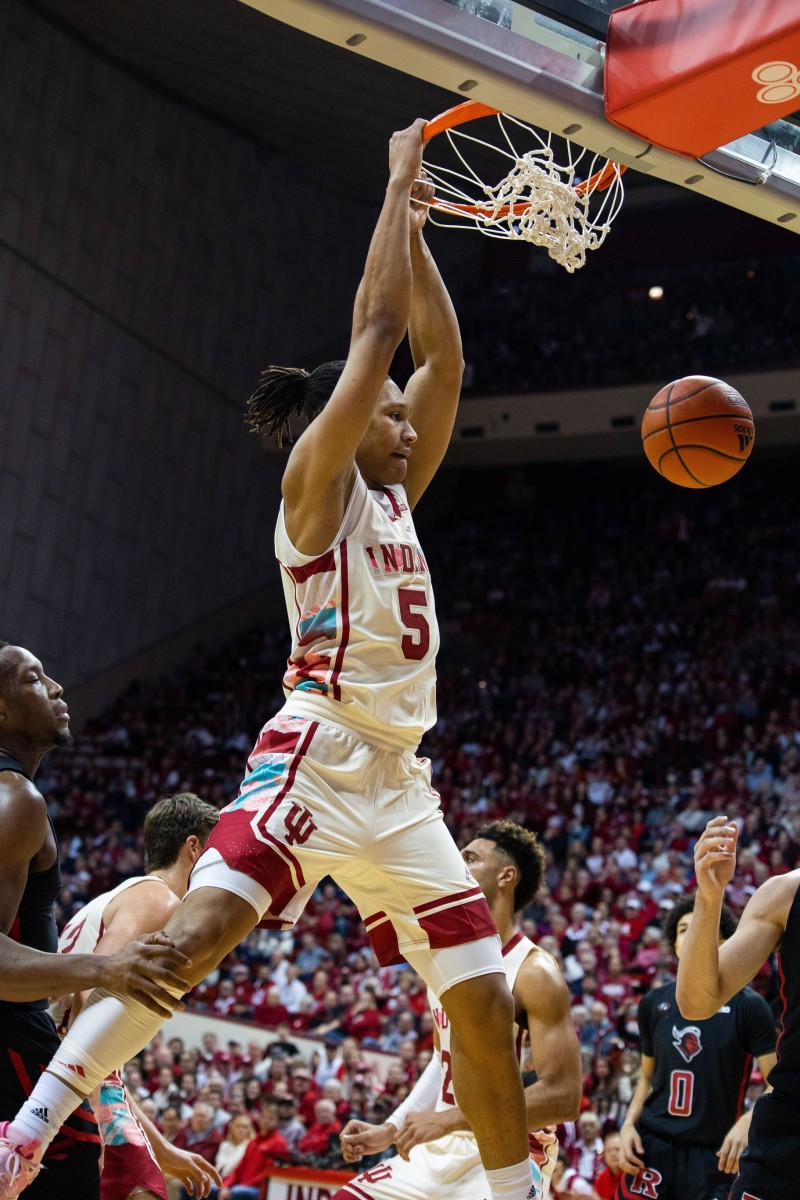Malik Reneau (5) dunks the ball in the first half against the Rutgers Scarlet Knights at Simon Skjodt Assembly Hall.