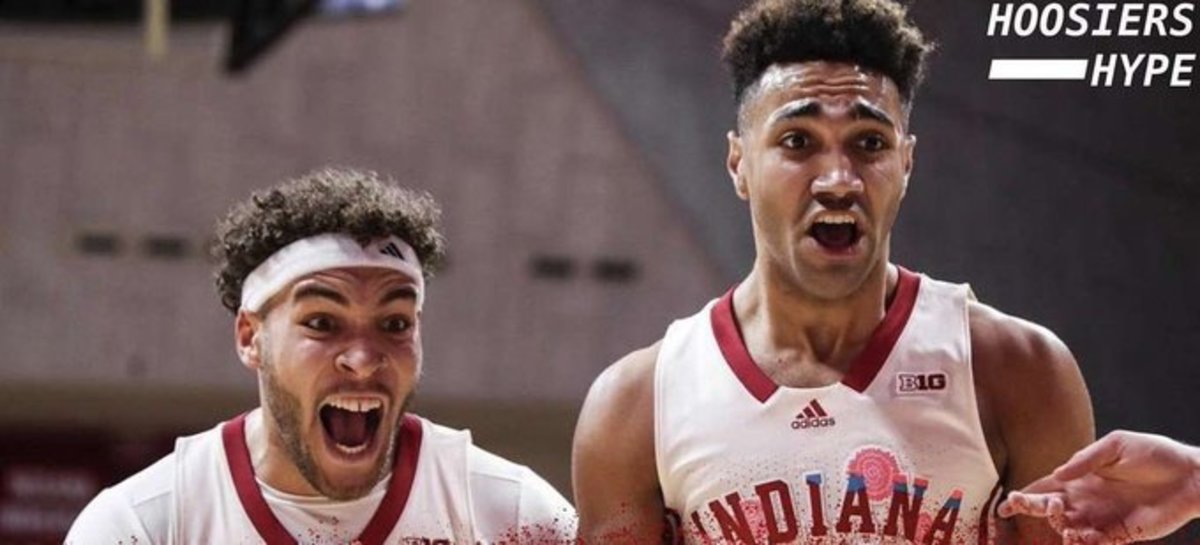 Indiana forwards Race Thompson (left) and Trayce Jackson-Davis (right) react to Jalen Hood-Schifino's behind-the-back layup against Rutgers. 
