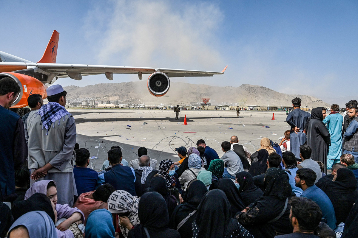 At the airport in Kabul, Rezaie and others were met by soldiers, mass chaos and barbed wire.