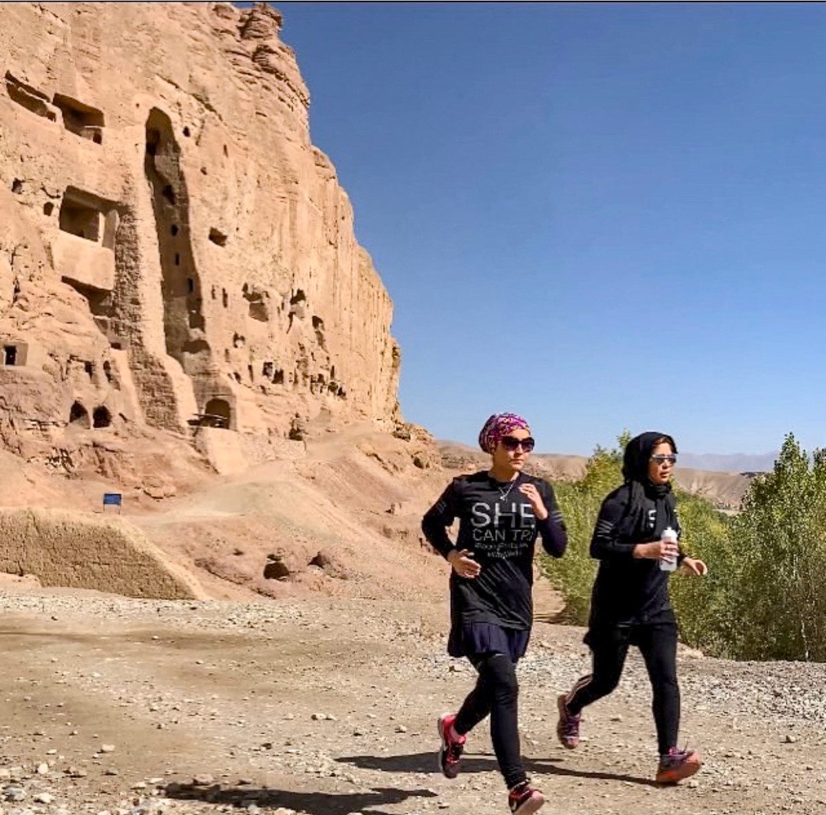 In running, says Case, Rezaie (right, in Bamyan) “found her voice. [She] dared to attempt athletic feats that few would take on.”