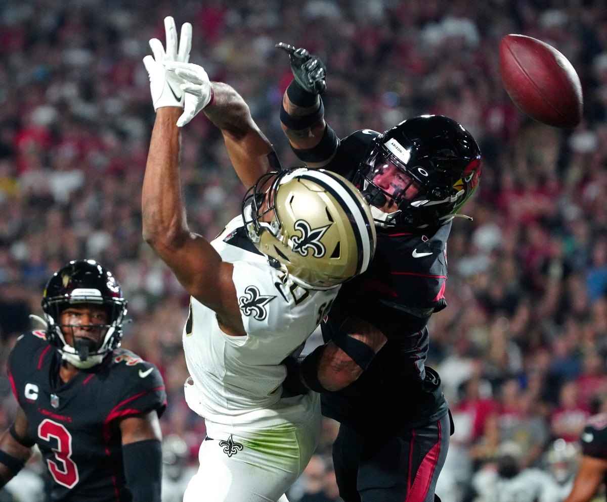 October 20, 2022; Cardinals Byron Murphy (7) breaks up a pass intended for Saints Tre'Quan Smith (10). © Patrick Breen/The Republic / USA TODAY NETWORK