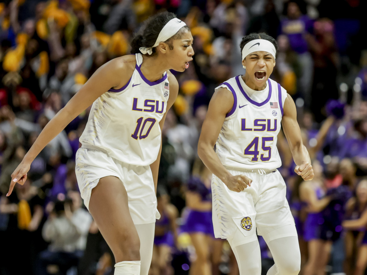 LSU guard Alexis Morris  and forward Angel Reese celebrate following a basket against Georgia in overtime.