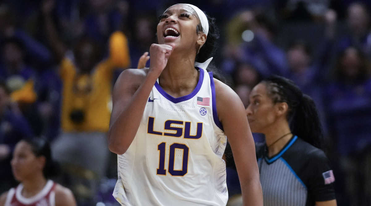 LSU forward Angel Reese celebrates after a turnover in the second half  against Arkansas.