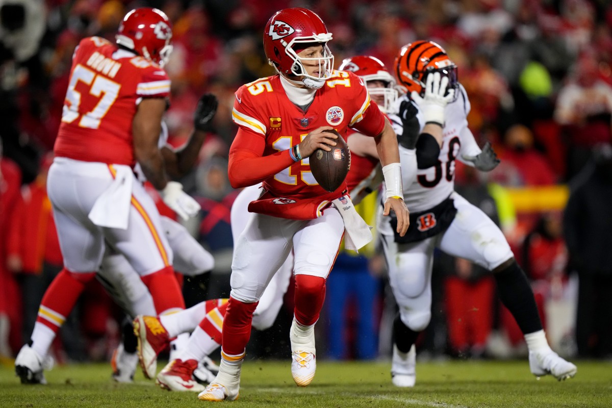 Kansas City Chiefs quarterback Patrick Mahomes (15) runs out of the pocket in the second quarter during the AFC championship NFL game between the Cincinnati Bengals and the Kansas City Chiefs,