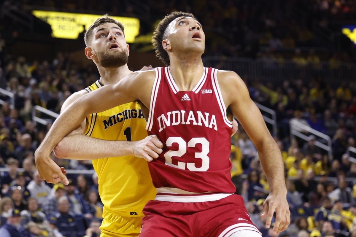 Michigan Wolverines center Hunter Dickinson (1) and Indiana Hoosiers forward Trayce Jackson-Davis (23) look for the rebound in the first half at Crisler Center.