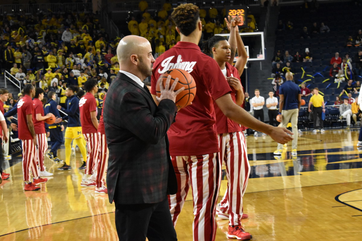 Clif Marshall takes the Indiana Hoosiers through pregame warmups before their matchup with the Michigan Wolverines.
