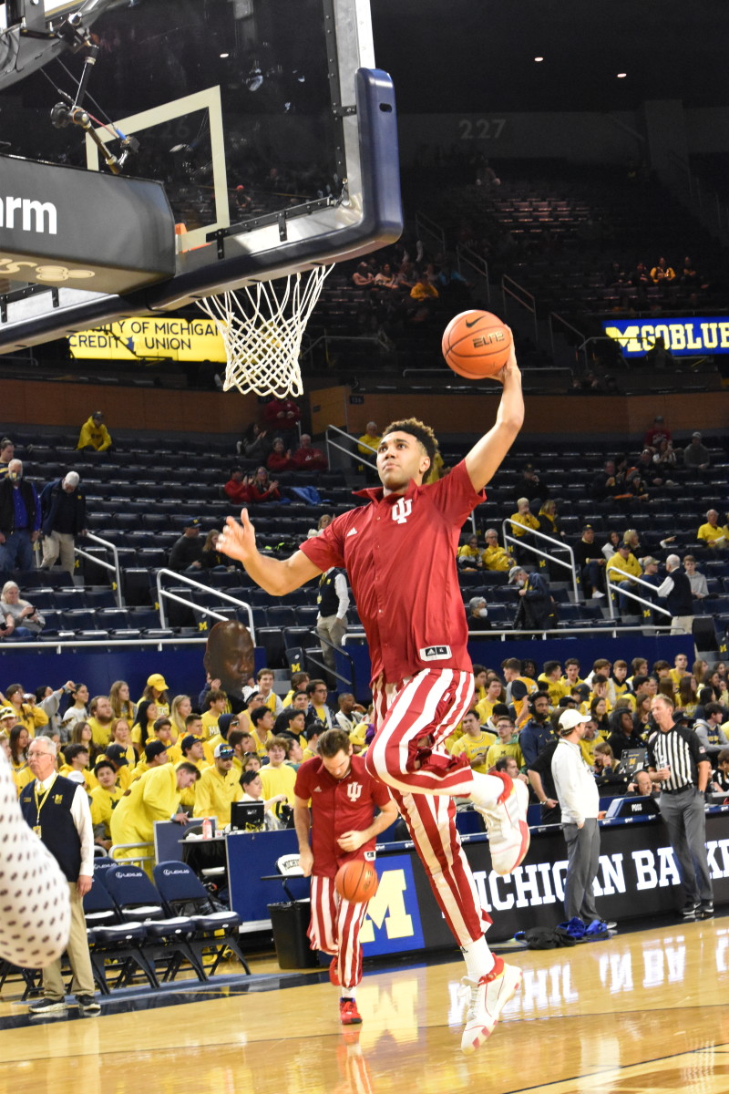 Trayce Jackson-Davis lead the team out of the locker room and straight to the hoop before Indiana's matchup with Michigan at Crisler Arena.