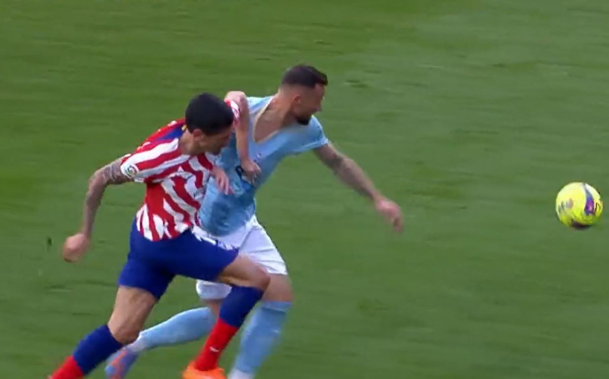 Stefan Savic pictured (left) pulling the jersey of Celta Vigo striker Haris Seferovic during Atletico Madrid's 1-0 win in February 2023