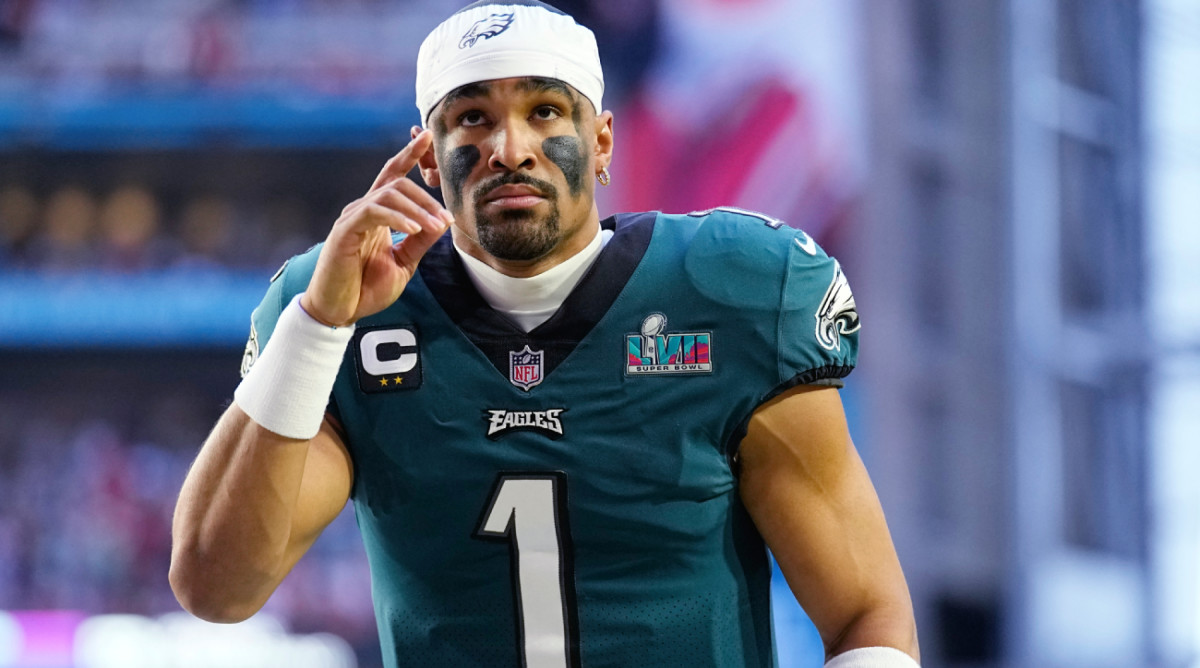 Philadelphia Eagles quarterback Jalen Hurts (1) runs on to the field before the start of the NFL Super Bowl 57 football game between the Kansas City Chiefs and the Philadelphia Eagles, Sunday, Feb. 12, 2023, in Glendale, Ariz. (AP Photo/Abbie Parr)