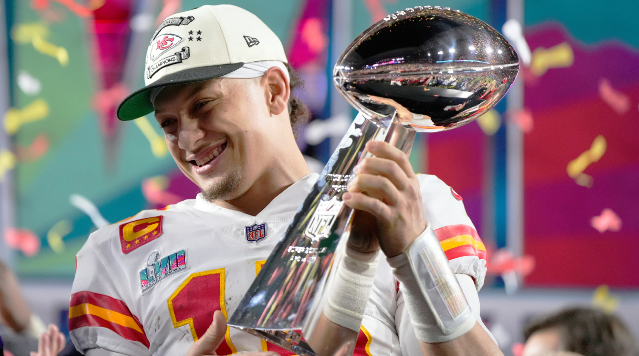 Kansas City Chiefs quarterback Patrick Mahomes (15) holds the trophy after their win against the Philadelphia Eagles in the NFL Super Bowl 57 football game, Sunday, Feb. 12, 2023, in Glendale, Ariz. The Kansas City Chiefs defeated the Philadelphia Eagles 38-35. (AP Photo/Matt Slocum)