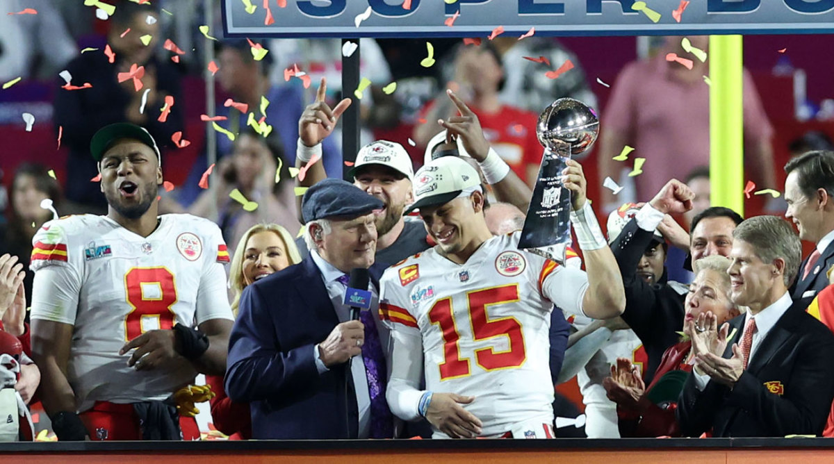 Patrick Mahomes holds the Lombardi Trophy after winning Super Bowl LVII.