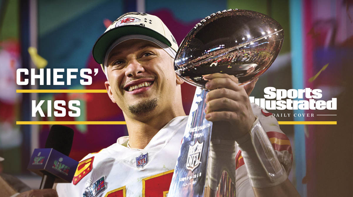 Patrick Mahomes smiles as he holds the Lombardi Trophy