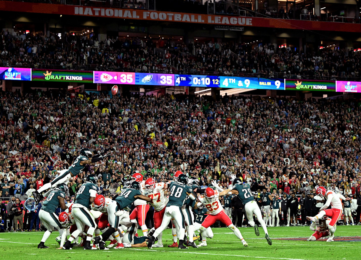 Harrison Butker kicks the game-winning field goal in Super Bowl LVII