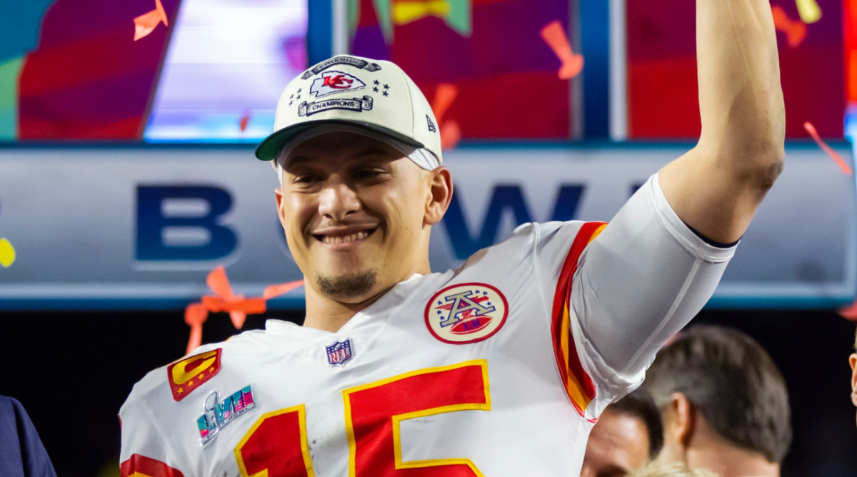 Chiefs quarterback Patrick Mahomes holds up the Lombardi Trophy after the team won Super Bowl LVII.
