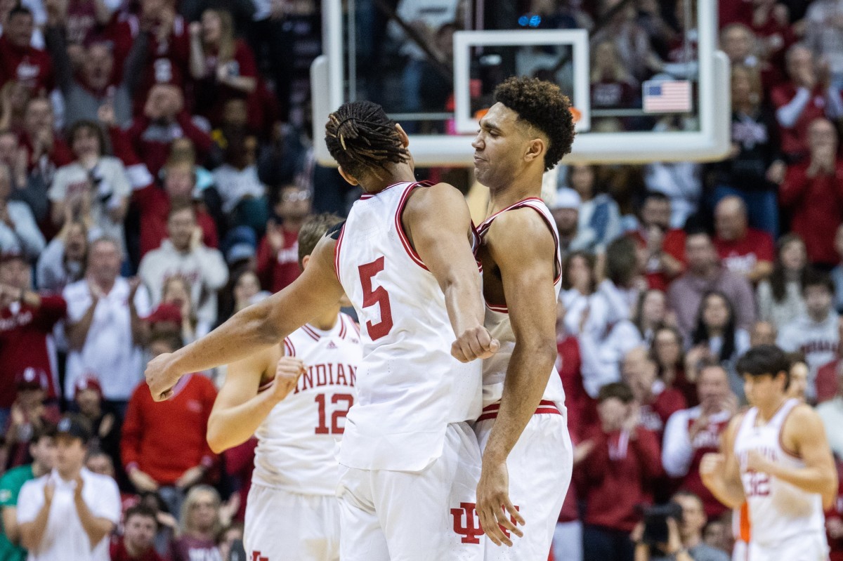 Indiana Hoosiers forward Trayce Jackson-Davis (23) and forward Malik Reneau (5) celebrate a made basket in the second half against the Illinois Fighting Illini at Simon Skjodt Assembly Hall.
