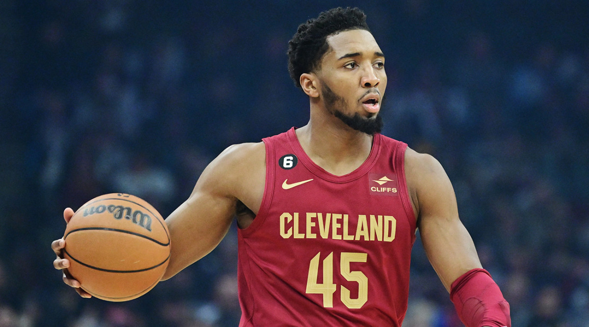 Cleveland Cavaliers guard Donovan Mitchell (45) brings the ball up court during the first quarter against the New Orleans Pelicans at Rocket Mortgage FieldHouse