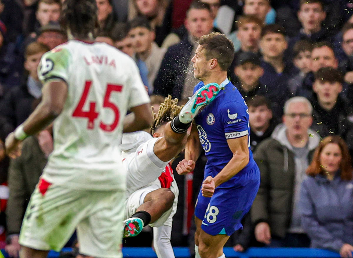 Cesar Azpilicueta pictured (right) moments after being accidentally kicked in the head by Sekou Mara during Chelsea's 1-0 loss to Southampton in February 2023