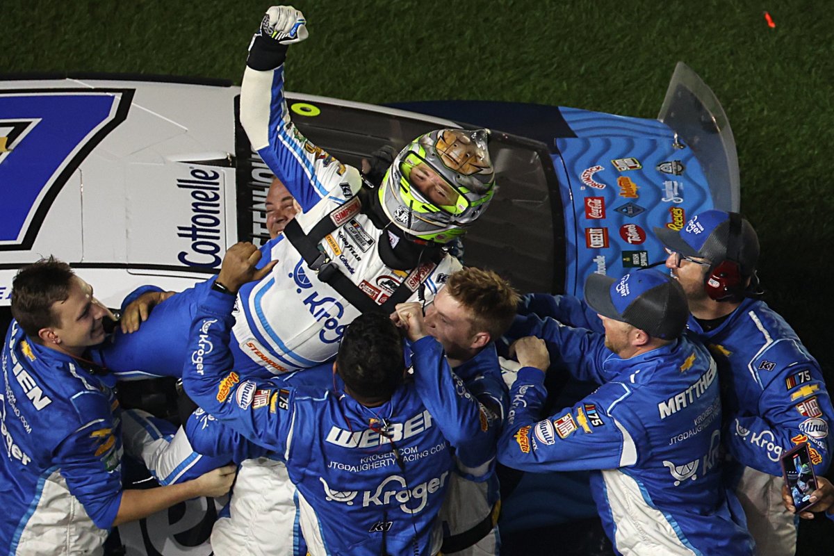 Ricky Stenhouse Jr. celebrates with his crew after winning the 65th annual Daytona 500 at Daytona International Speedway. (Photo by Mike Ehrmann/Getty Images)