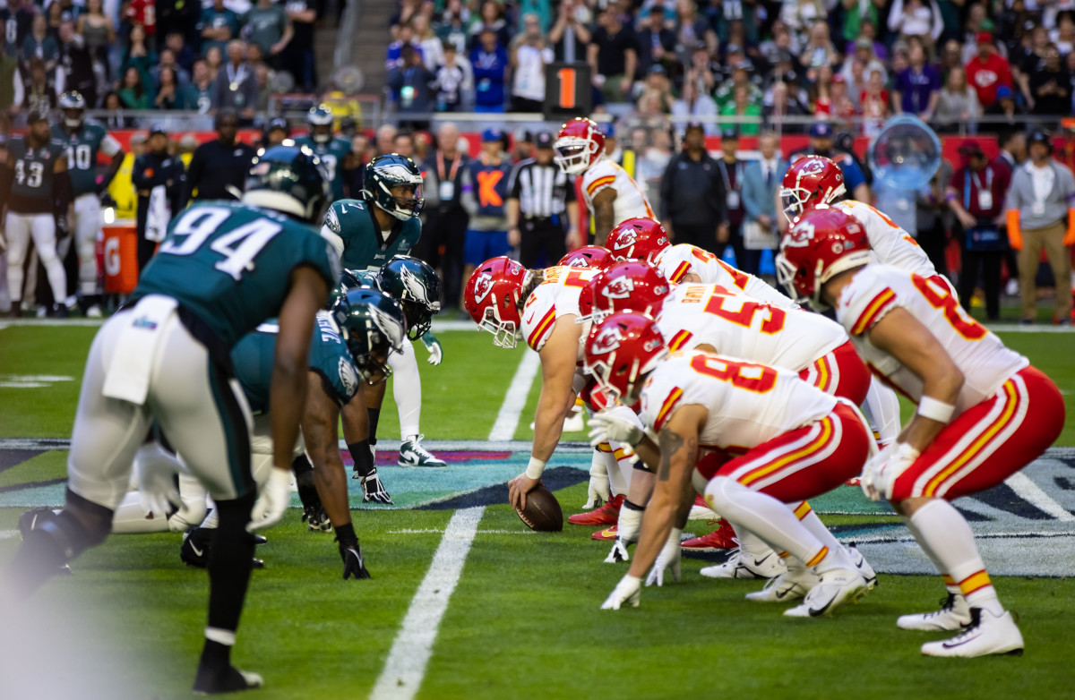 The Chiefs get ready to snap the ball before their first play of Super Bowl LVII