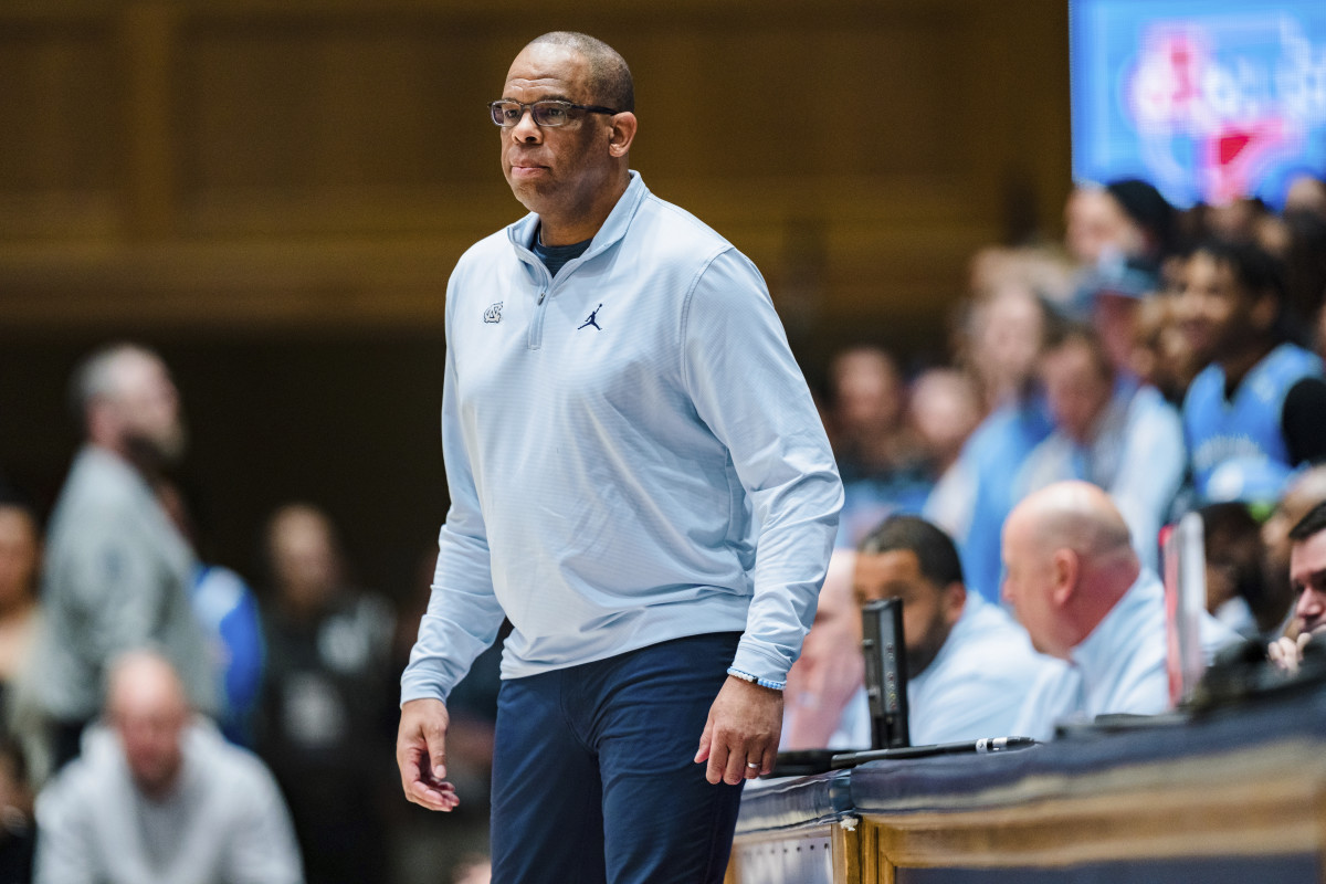 North Carolina men’s basketball coach Hubert Davis calls a play from the sideline in a game against Duke.