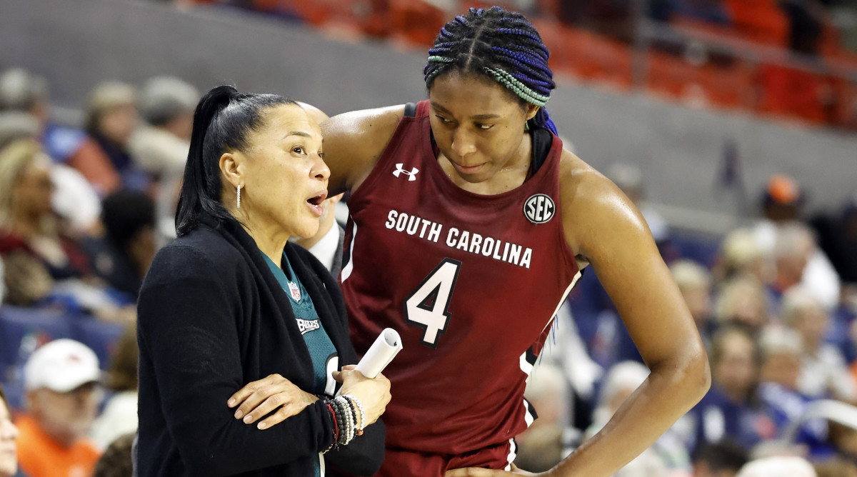 South Carolina head coach Dawn Staley talks with forward Aliyah Boston during the second half of a game against Auburn.