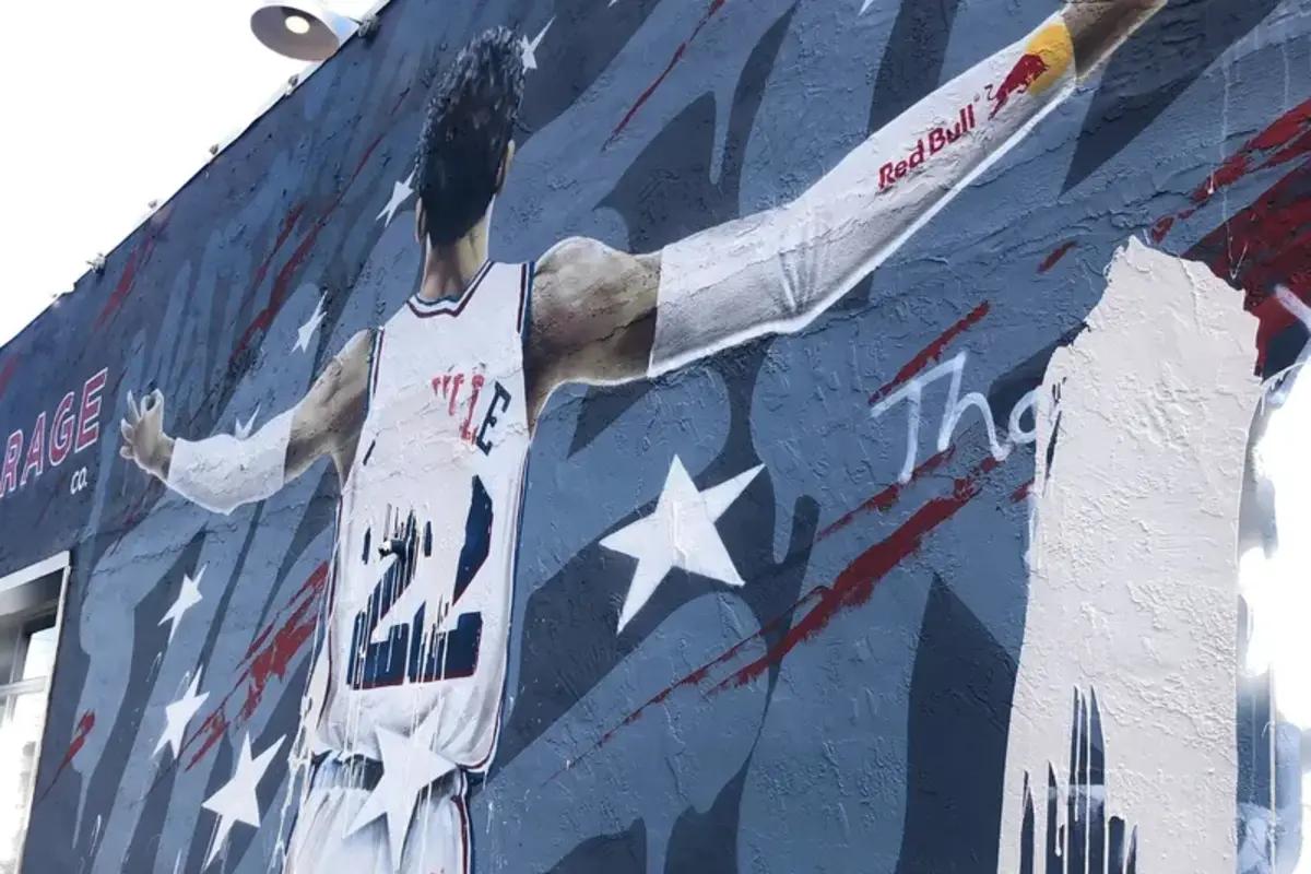 Matisse Thybulle's mural after the trade, via Jason Evenchik and The Philadelphia Inquirer