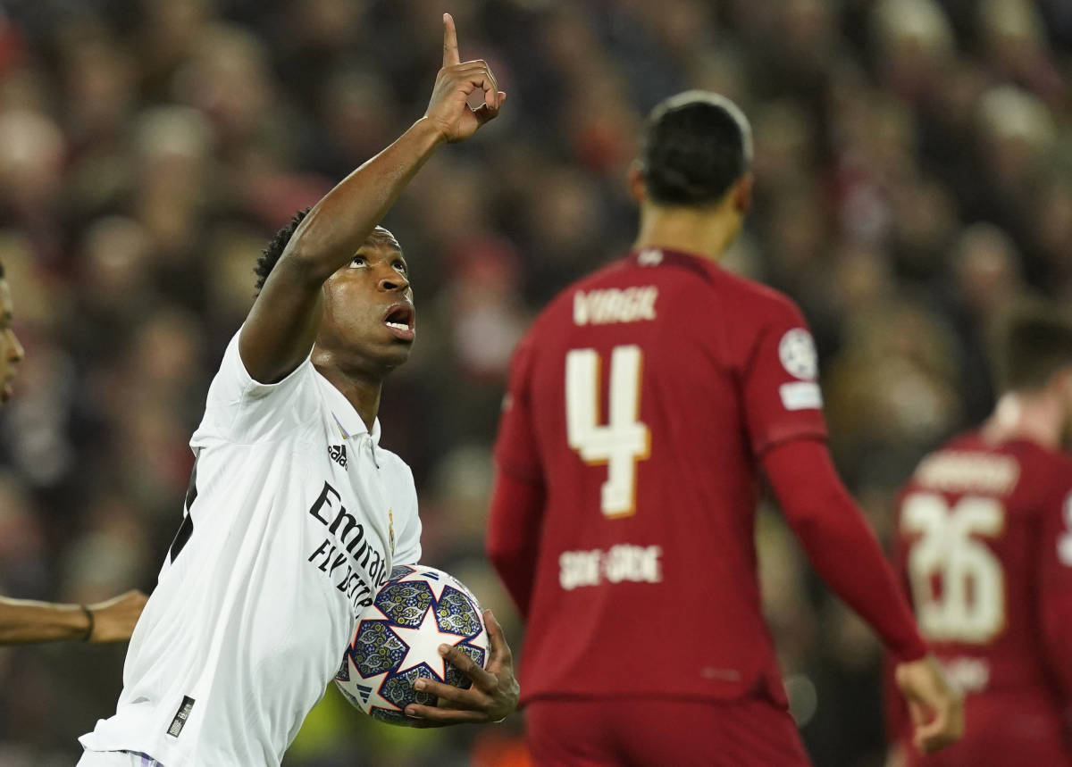 Vinicius Junior pictured celebrating his first goal of the game in Real Madrid's 5-2 win over Liverpool at Anfield in February 2023