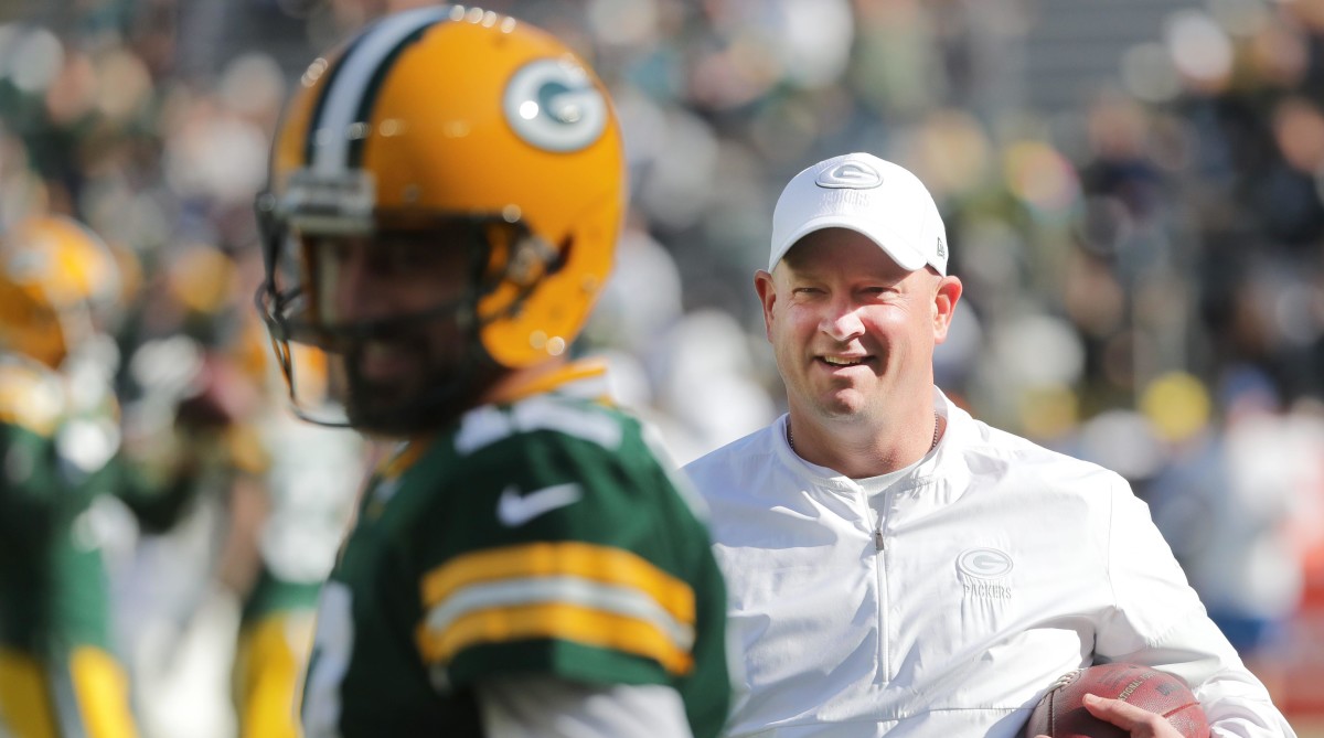 Packers quarterback Aaron Rodgers with former OC Nathaniel Hackett.
