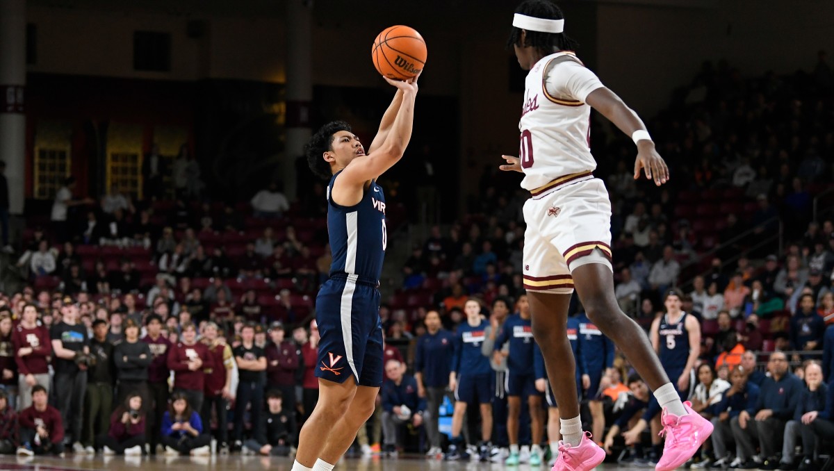 Virginia Cavaliers guard Kihei Clark (0) shoots over Boston College Eagles guard Chas Kelley (00) during the first half at Conte Forum.