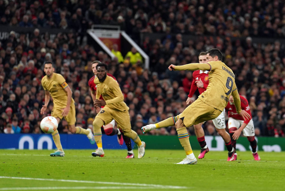 Robert Lewandowski pictured scoring a penalty kick for Barcelona against Manchester United at Old Trafford in February 2023