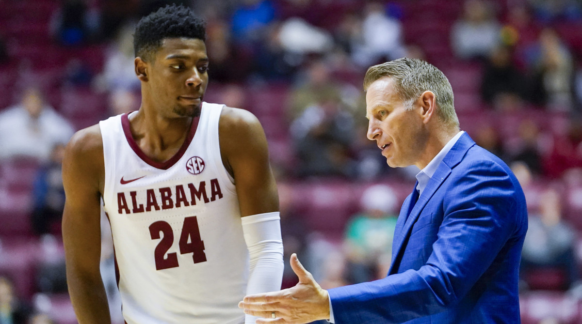 Alabama Crimson Tide head coach Nate Oats talks to Alabama Crimson Tide forward Brandon Miller during the second half against the Jackson State Tigers at Coleman Coliseum.
