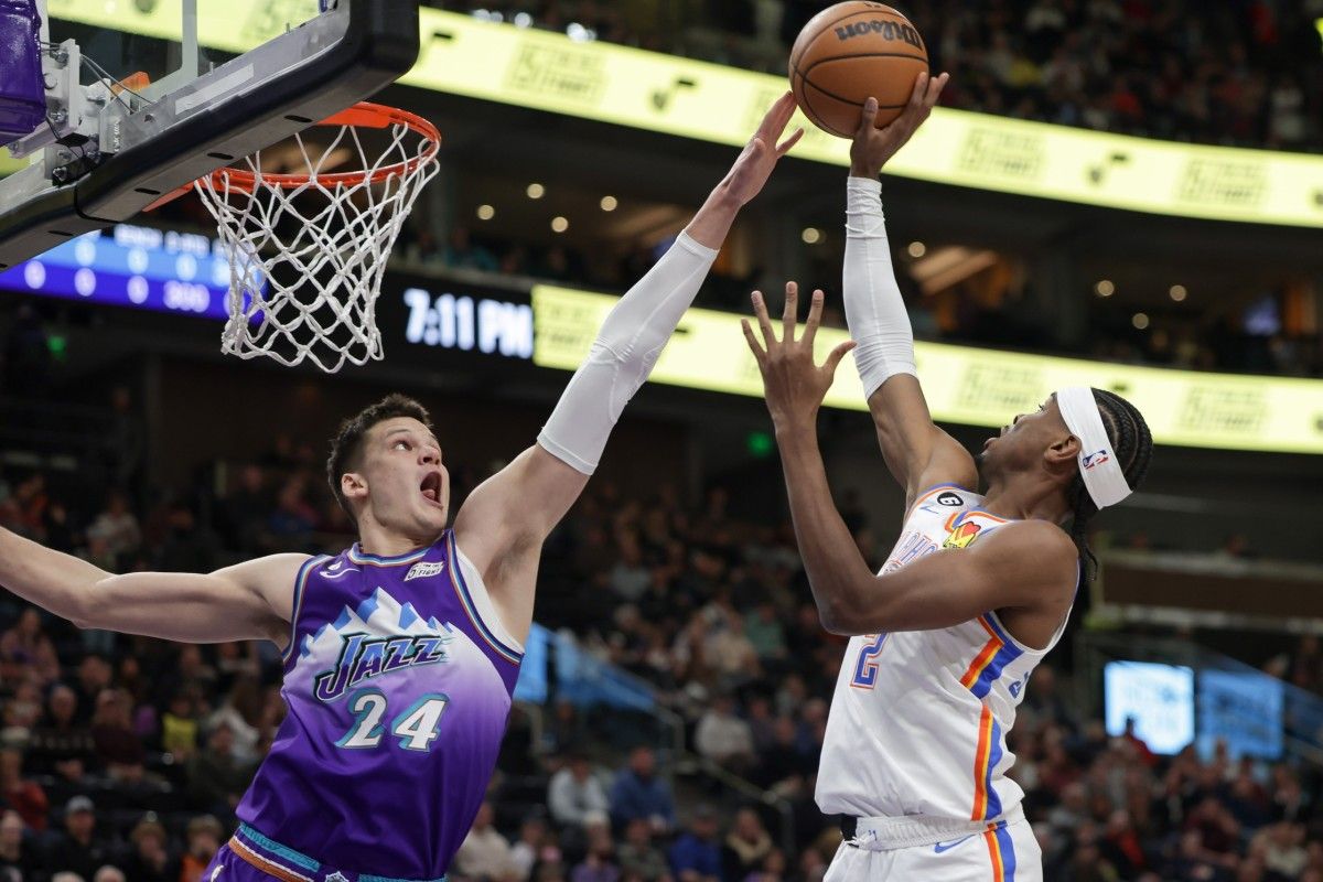 Utah Jazz center Walker Kessler (24) blocks the shot of Oklahoma City Thunder guard Shai Gilgeous-Alexander (2) during the first quarter at Vivint Arena.