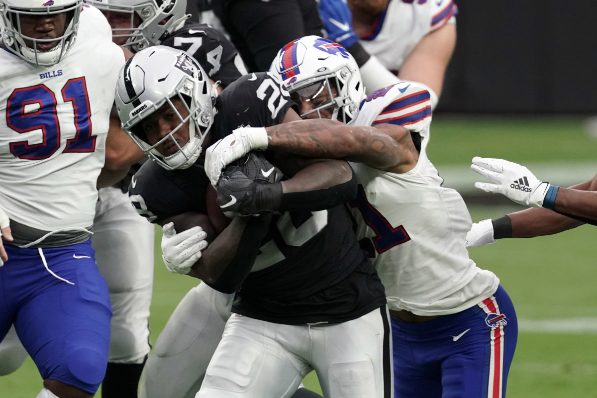 Josh Jacobs going in reverse in the Las Vegas Raiders' 38-10 loss to the  Buffalo Bills
