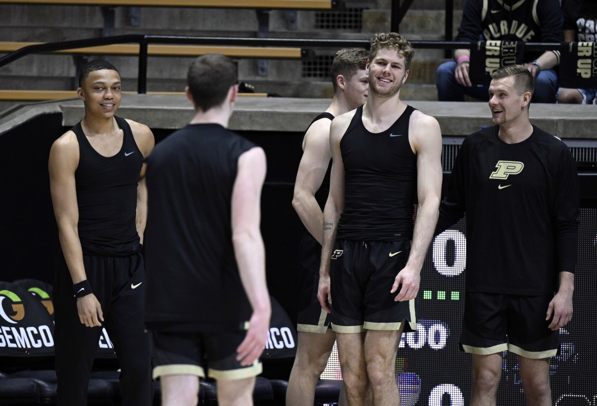 Purdue Boilermakers forward Caleb Furst smiles at guard Braden Smith before the game against the Indiana Hoosiers at Mackey Arena.
