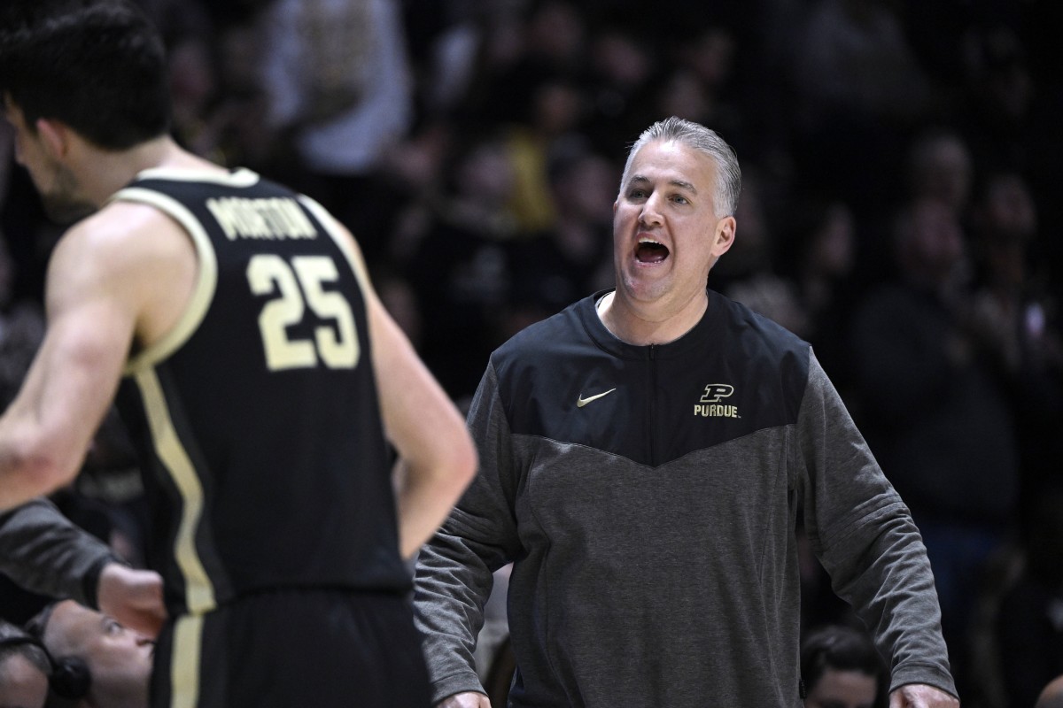 Purdue Boilermakers head coach Matt Painter has a word with guard Ethan Morton (25) during the first half against the Indiana Hoosiers at Mackey Arena.
